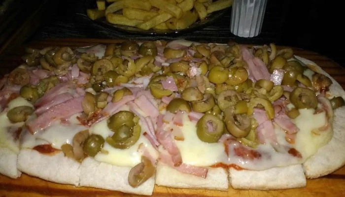 Clan:  Destino Pizza - Pub restaurante